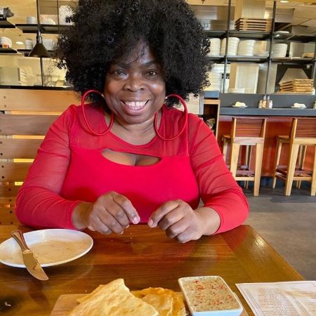 Shola Adewusi eating her break fast.